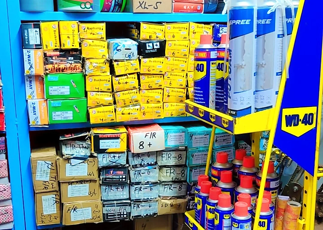 Hardware stock and WD-40 stand inside Al Abbas Hardware Mart